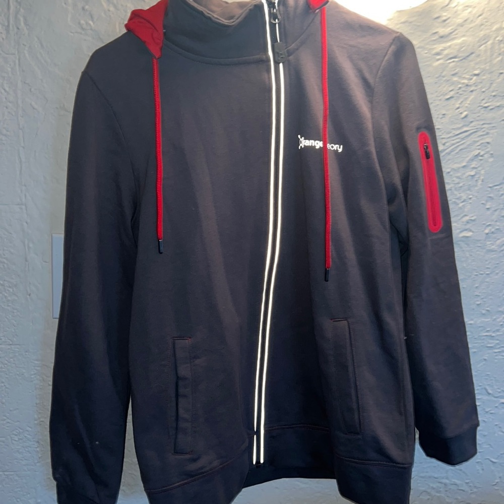 Brand new NEVER WORN orange theory hooded zip up